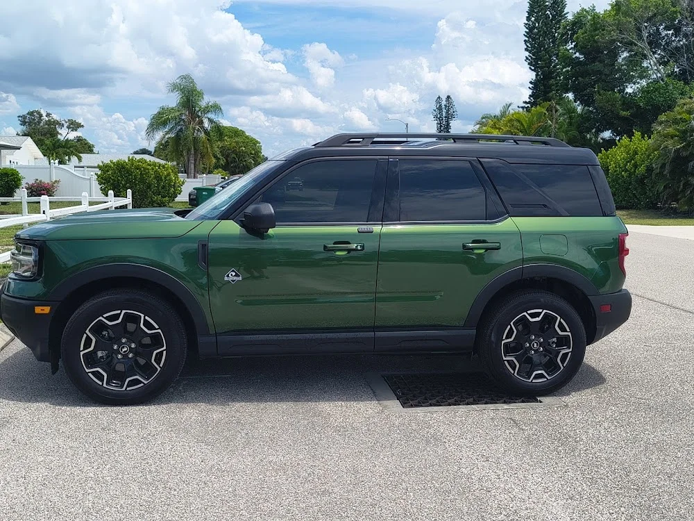 Green SUV with tinted windows photographed outside, photographed by Google reviewer Tony Bergeron